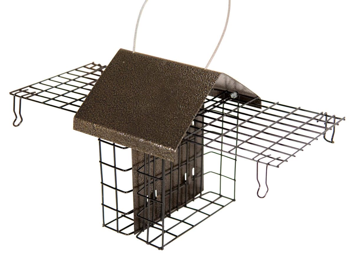 Product shot of a bronze-colored metal squirrel-resistant bird feeder with a protective roof and wire mesh sides featuring a hanging loop and detailed textured finish