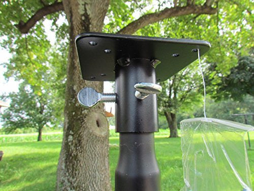 Metal mounting flange securely attached to a 1-inch pole, designed for bird feeders and houses in a garden setting.