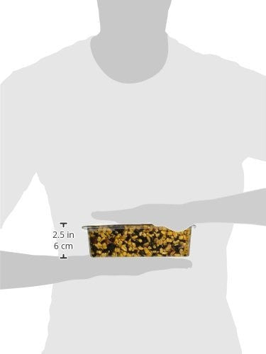 Product shot showing a clear plastic container of granola with nuts, seeds, and dried fruit held in a hand against a white background