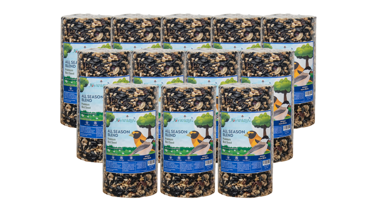 JCs Wildlife's photograph shows twelve cylindrical packages of All Season Blend premium bird seed featuring sunflower seeds, peanuts, and dried cranberries against a white background.