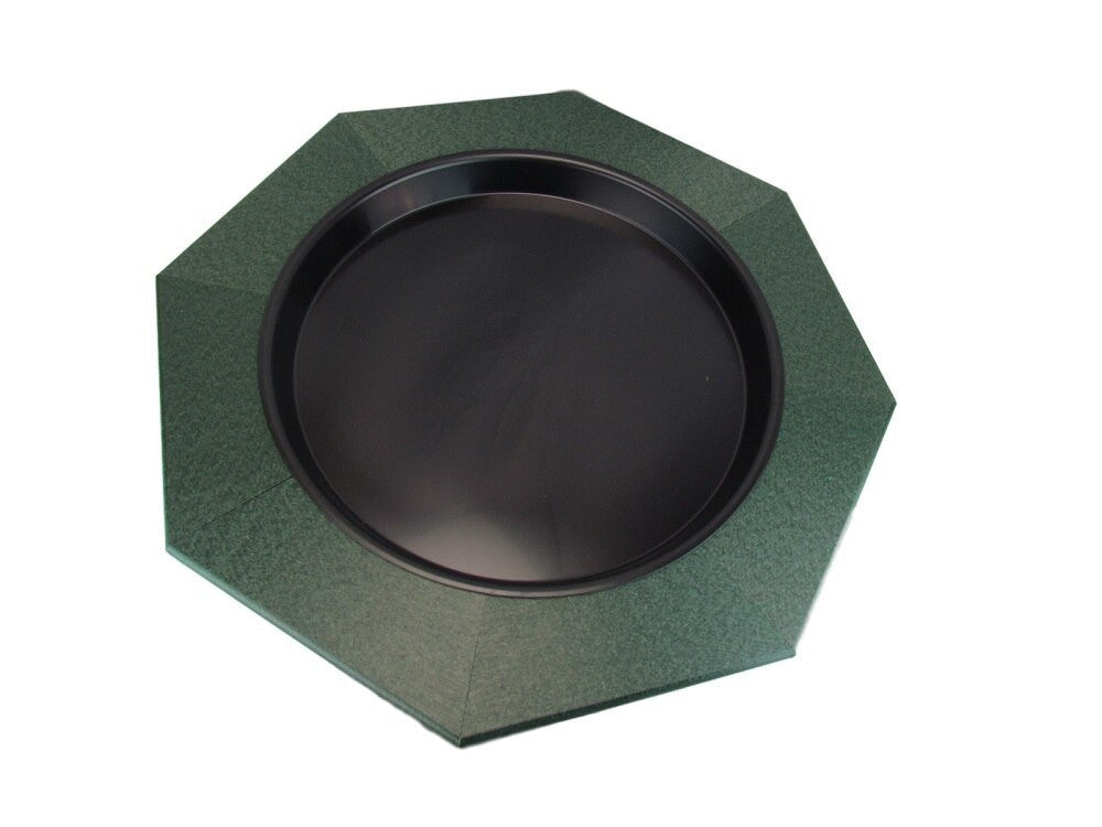 Plastic octagonal tray with a dark green textured border and a black center showing subtle variations in tone and sheen