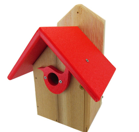 Wooden birdhouse with red roof and bird-shaped entrance featuring bright red accents and visible wood grain details