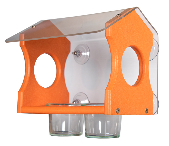 Plastic bird feeder with orange accents and clear acrylic roof featuring two glass cups and suction cups for window mounting