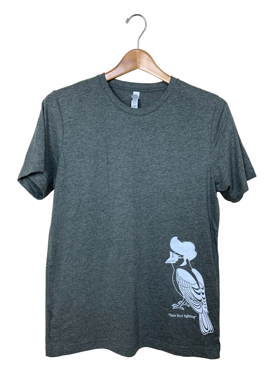 T-shirt design featuring a stylish, white bird wearing sunglasses on a dark gray shirt with the text Rare Bird Sighting