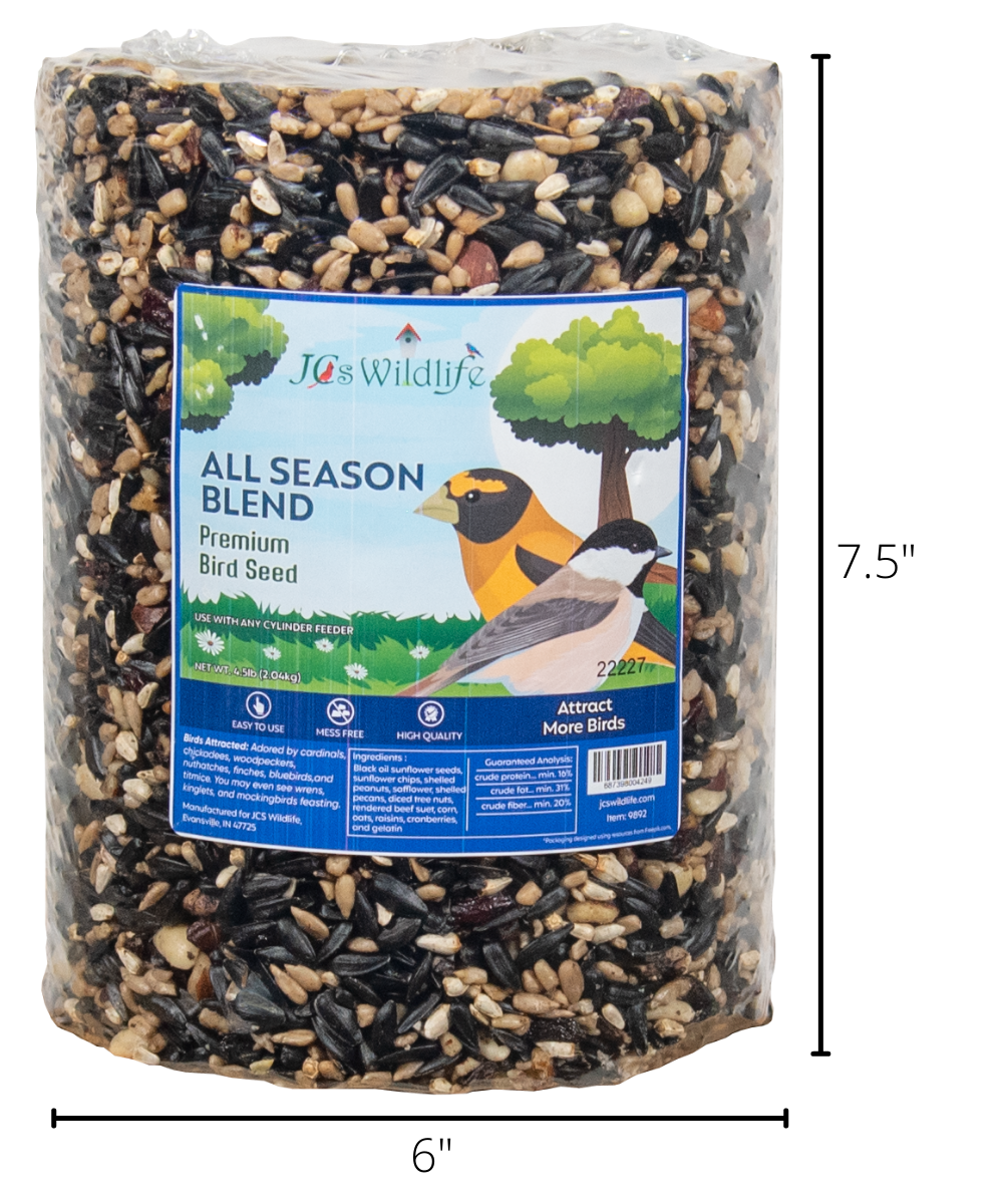 JCs Wildlife product photography shows a 6x7.5 inch cylinder of All Season Blend premium bird seed featuring black oil sunflower seeds, cranberries, and peanuts alongside images of birds on the label