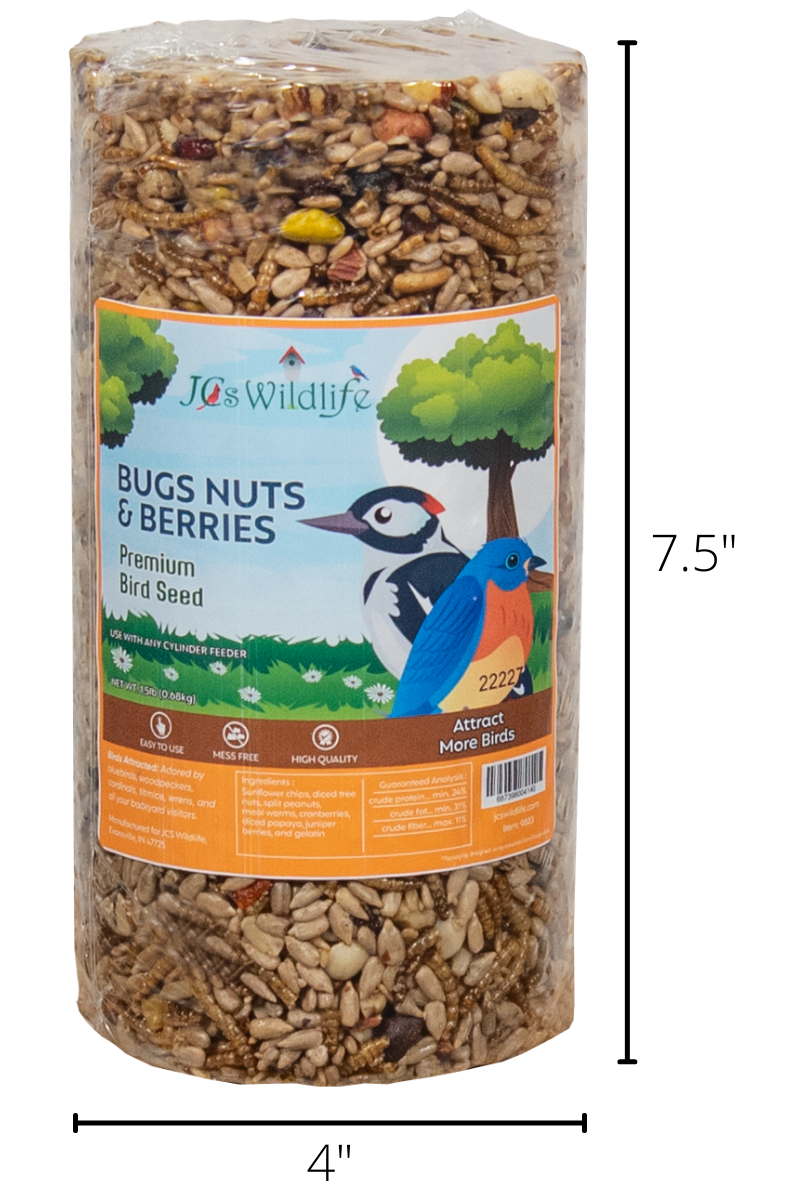 JCs Wildlife Bugs Nuts & Berries Premium Bird Seed cylindrical package showing a downy woodpecker and bluebird against a green tree background with sunflower seeds, dried cranberries, and mealworms