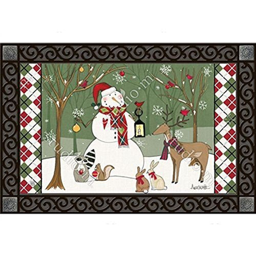 A whimsical doormat by Annette Owen depicts a snowman in a snowy winter woodland scene with a deer, rabbits, and a raccoon near bare trees adorned with red cardinals and snow flakes