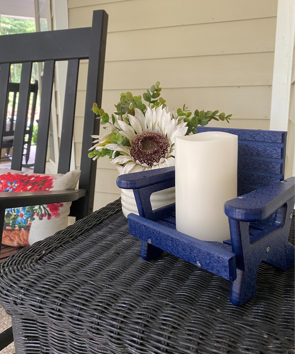 JCS Wildlife Mini White Adirondack Chair Candle Holder with white candle, perfect for lake life decor.