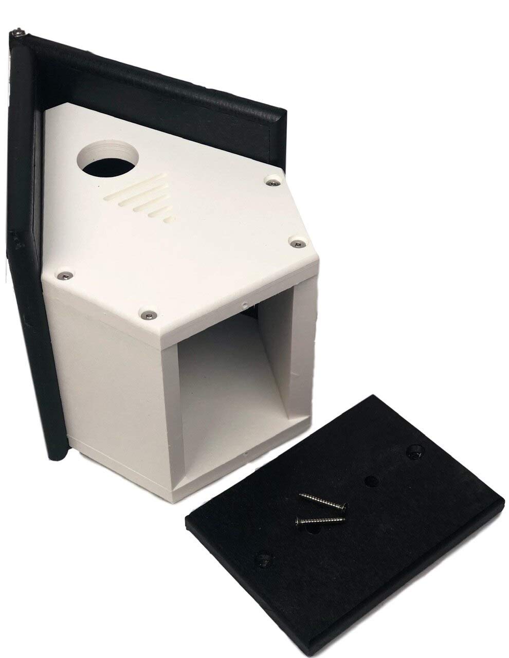 Disassembled plastic birdhouse featuring a white body black trim and small ventilation slots shown with its removable black base and mounting screws