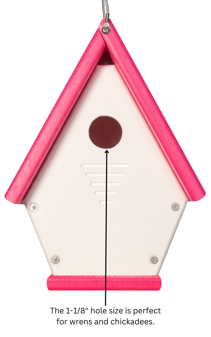 Birdhouse with pink roof and 1-1/8" hole, ideal for wrens and chickadees.