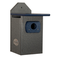 JG Wildlife gray and blue composite birdhouse with a dark blue entryway and a peaked roof showing visible screws and a logo