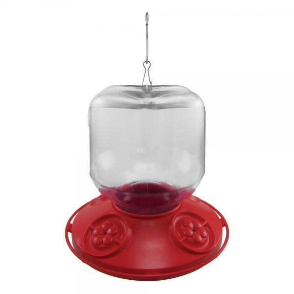 Plastic hummingbird feeder with a clear reservoir a red base and three flower-shaped feeding ports featuring a metal hanging hook