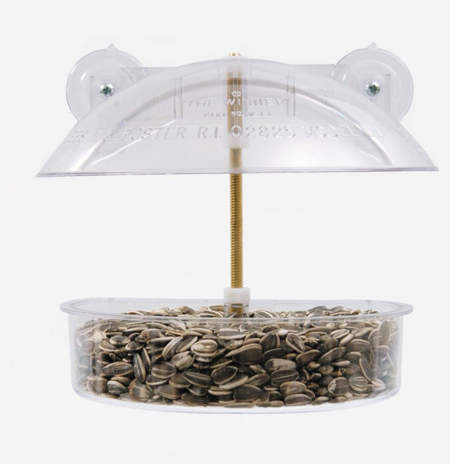Droll Yankees Window Birdfeeder with .5 lbs seed capacity, clear polycarbonate construction for unobstructed bird viewing.