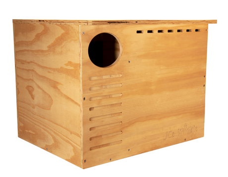 JCs Wildlife wooden birdhouse featuring a circular entrance hole ventilation slots and a light brown wood finish