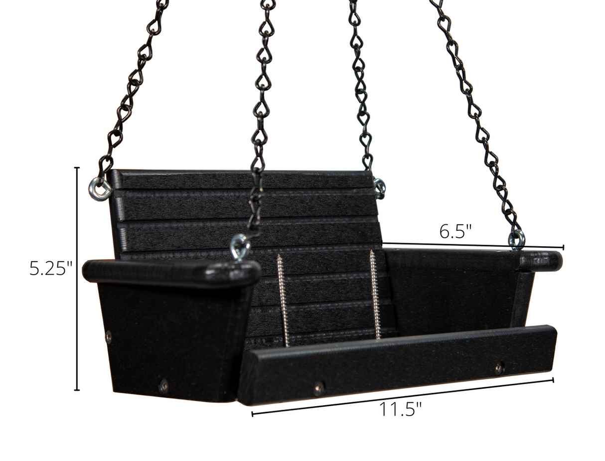 Product shot showing a black plastic two-seater swing with metal chains and visible screws against a white background