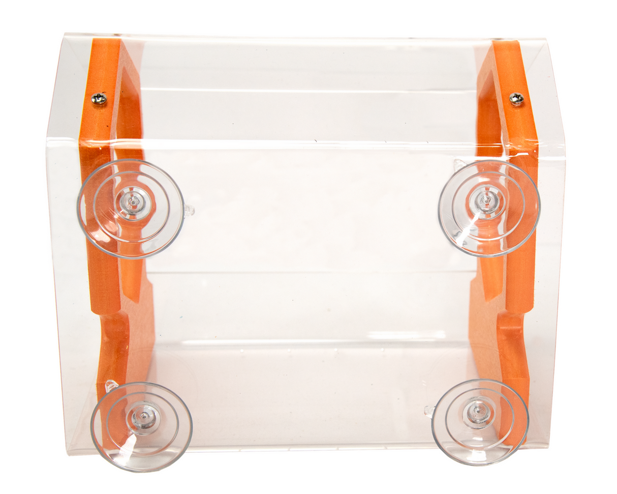 Product shot of a clear acrylic hummingbird feeder with orange plastic accents and four suction cups.