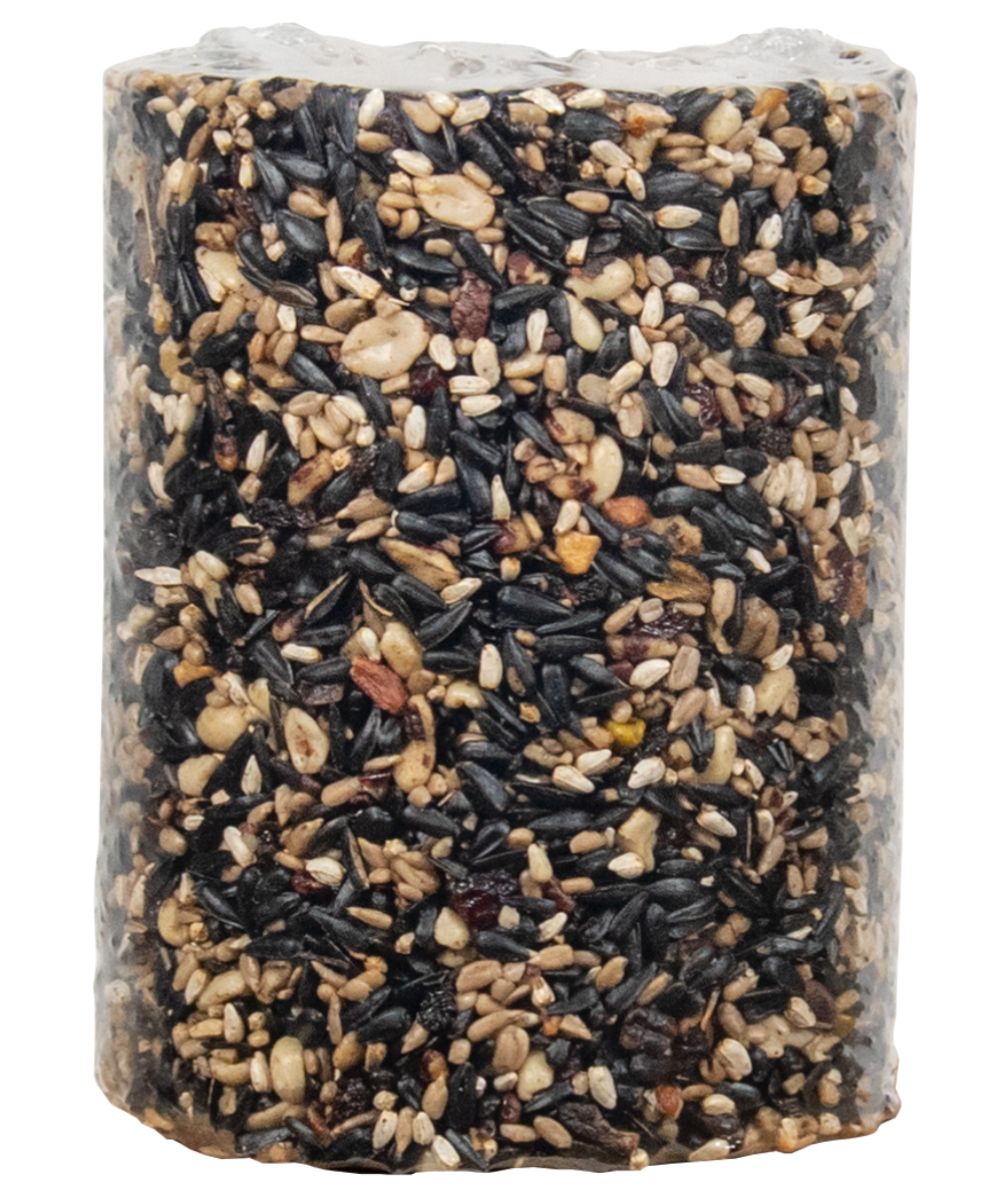 Product shot of a block of birdseed containing sunflower seeds peanuts and dried cranberries in a clear plastic wrapper