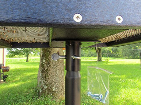 Close-up of Metal Mounting Flange for 1-inch poles with included screws, designed for bird feeders and houses.