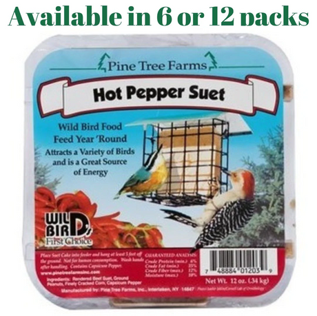 Pine Tree Farms packaging showing a red-bellied woodpecker and a downy woodpecker feeding on hot pepper suet in a wire cage feeder with vibrant red peppers and a blue background