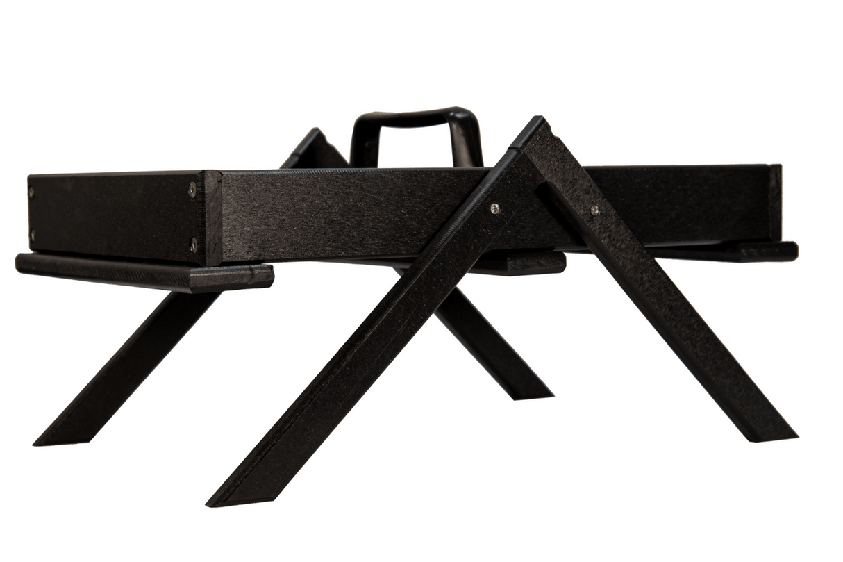Black plastic tray with a handle and X-shaped legs showing visible screws and a textured surface against a white background