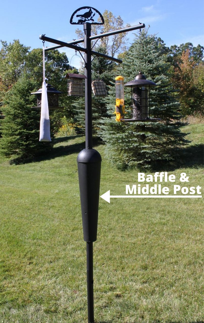 Replacement baffle and middle post segment for Squirrel Stopper Deluxe bird feeder assembly post in black, set up in a garden.