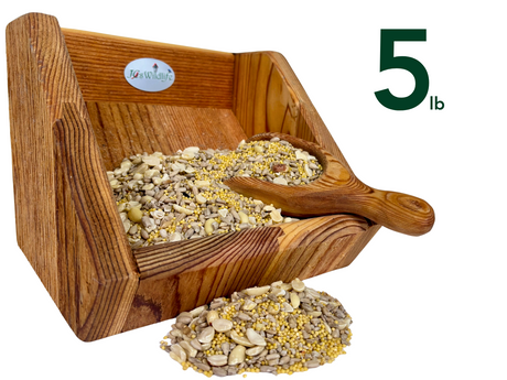 JQs Wildlife wooden bird feeder filled with five pounds of birdseed containing sunflower seeds peanuts and millet in a rustic wooden scoop and tray.