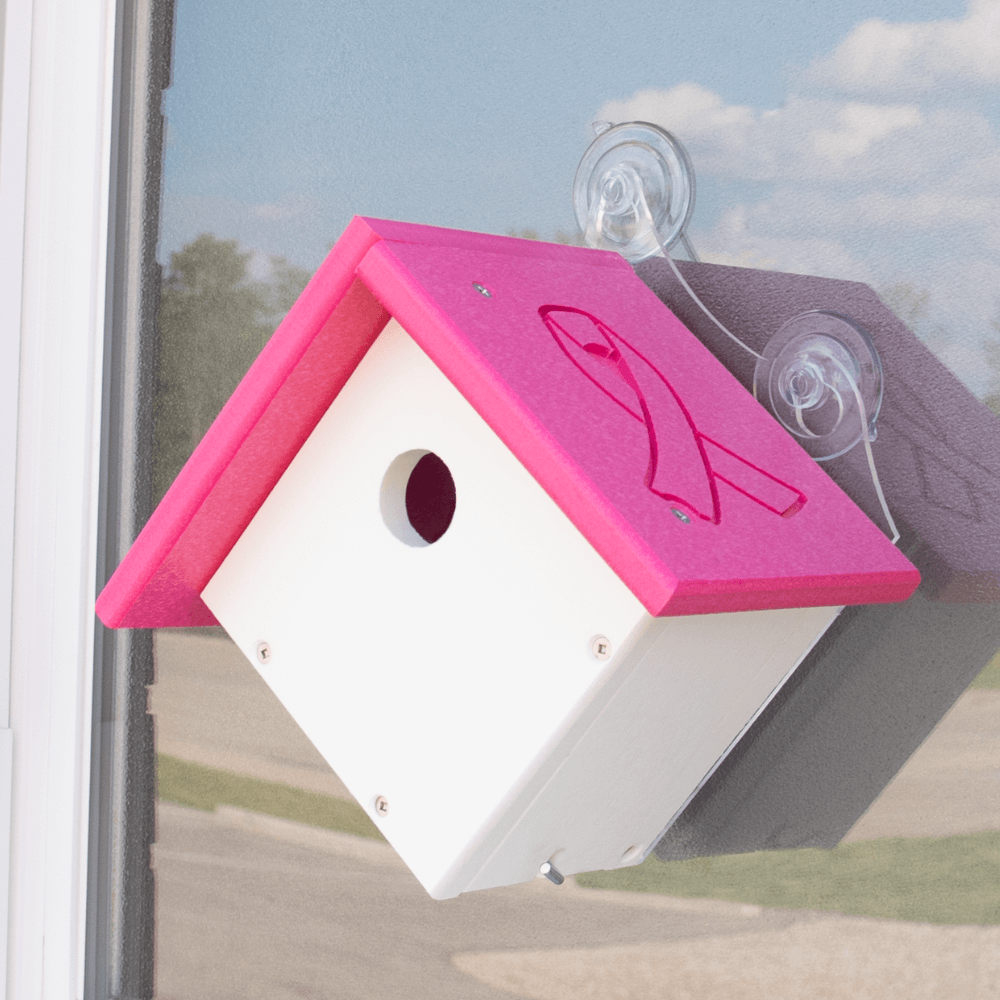 A pink and white birdhouse with a breast cancer awareness ribbon, part of Annie's Breast Cancer Collection.