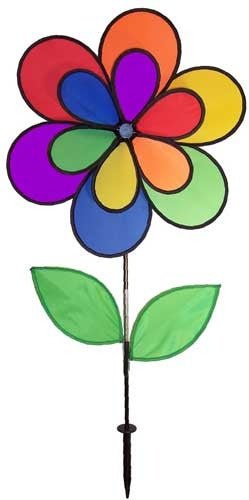 Fabric garden spinner multicolored rainbow flower with green leaves on a black stem
