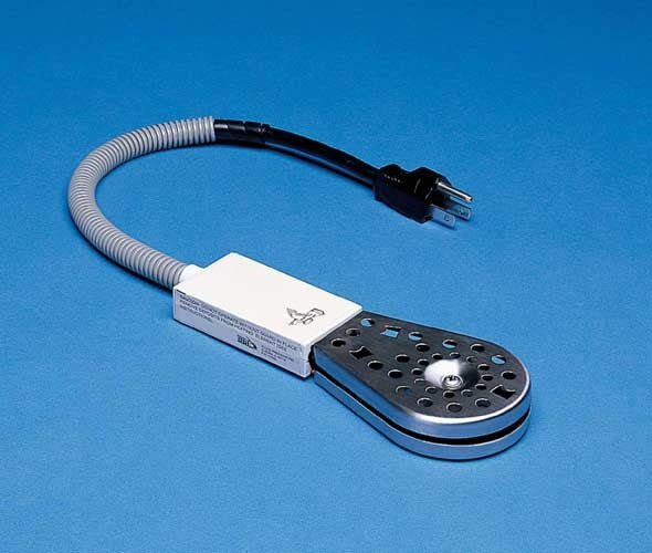 Product shot of a gray and white electric heating element with a flexible cord and a three-prong plug against a blue background showcasing its metallic gray housing and perforated design with a central heating element.