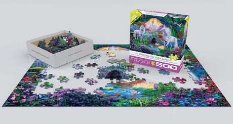 EuroGraphics Unicorn Fairy Land 500-piece jigsaw puzzle partially completed with box and pieces scattered on table