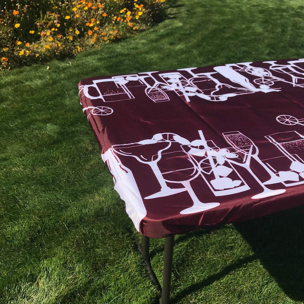 Happy Hour Drinks 6 Foot Fitted Tablecloth on outdoor table with vibrant design and secure fit