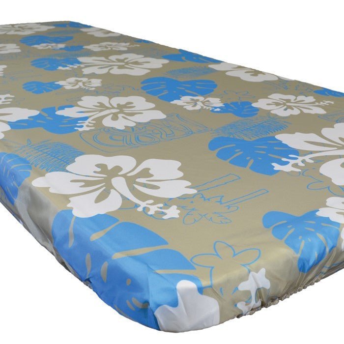 In the Breeze Tropical 6 Foot Fitted Tablecloth with blue and white floral design on tan background, fitted securely to table