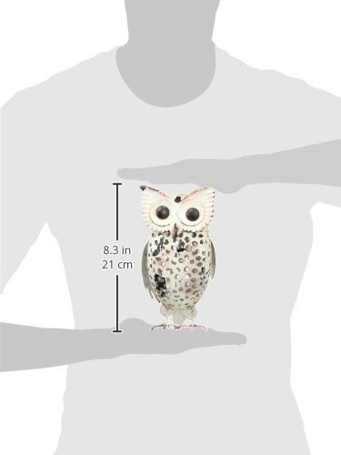 Ivory Owl Decor 8 Inch Regal Art & Gift 11101 held by a person for size reference, hand-crafted and painted, fits indoor and outdoor decor.