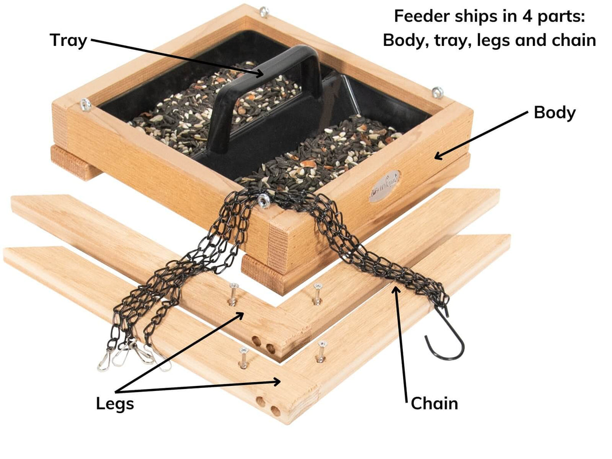 Parts of JCS Wildlife Cedar Platform Ground Feeder Medium: tray, body, legs, and chain for easy assembly and use.