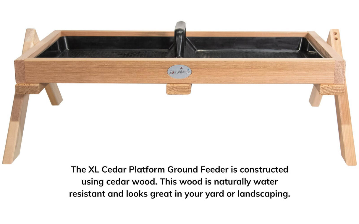 JCS Wildlife Cedar Platform Ground Feeder XL made of water-resistant cedar wood, ideal for attracting birds in your garden.