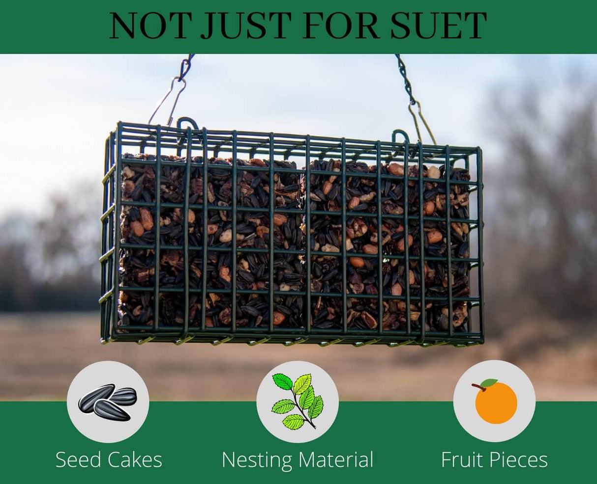 JCS Wildlife Double Suet Feeder Cage holding seed cakes, nesting material, and fruit pieces for versatile bird feeding.
