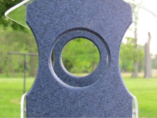 Close-up of JCS Wildlife bird feeder made from recycled poly lumber showcasing the circular feeding hole.