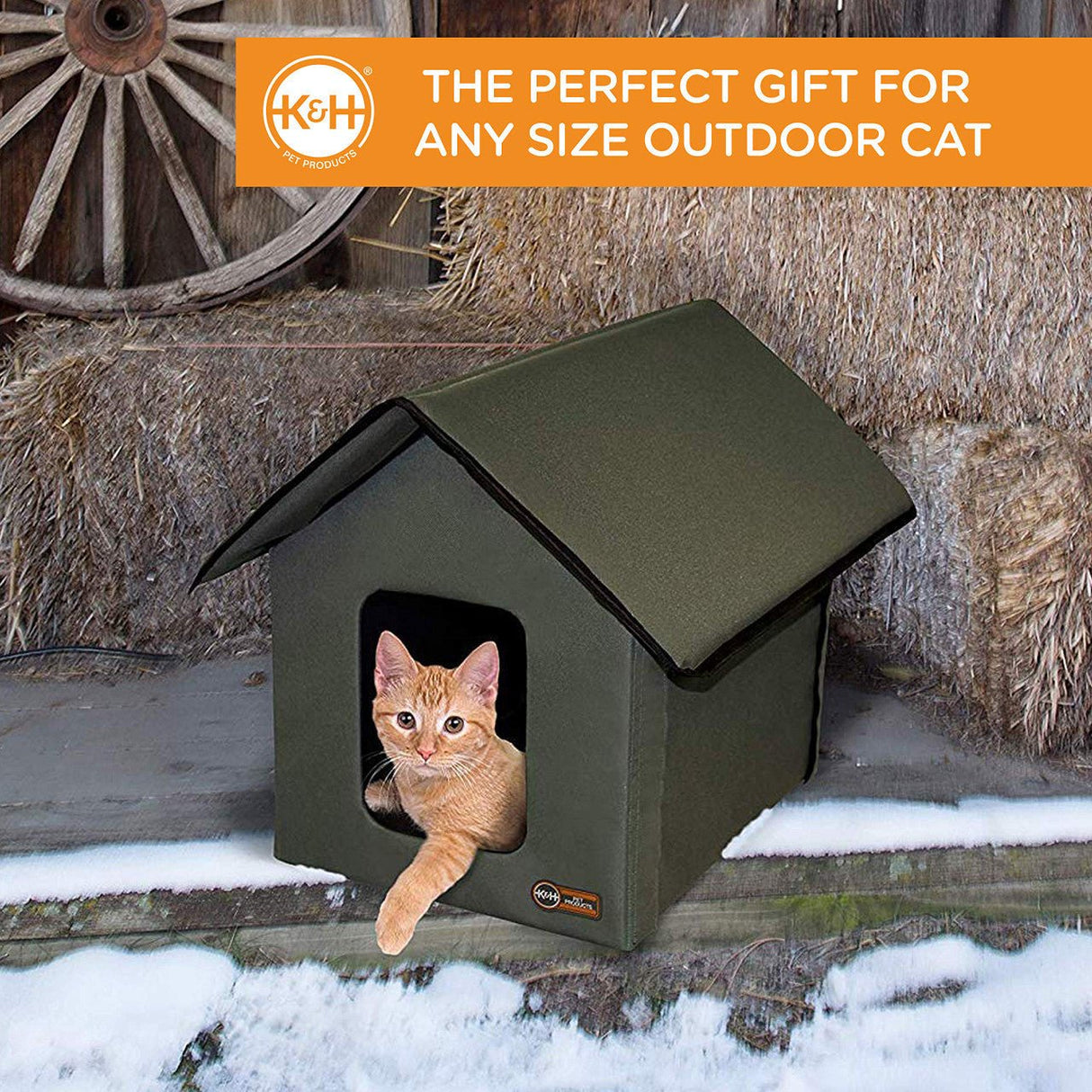 Outdoor cat sitting inside K&H Outdoor Heated Kitty House Barn on a porch, with text "The perfect gift for any size outdoor cat" in the background.