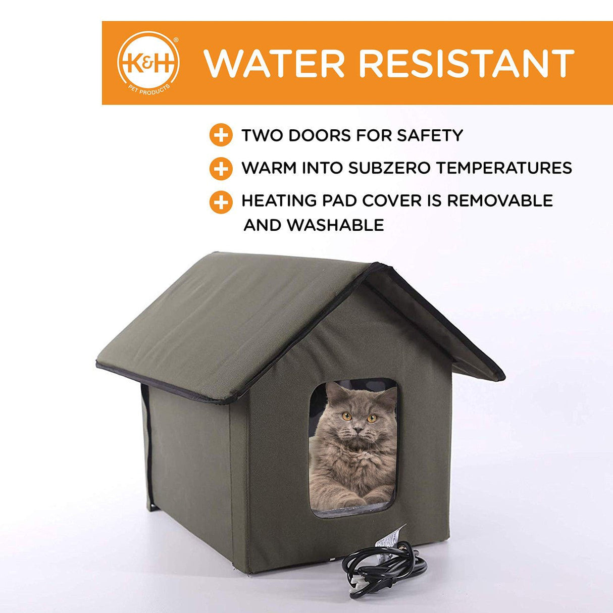 K&H Outdoor Heated Kitty House Barn with a cat inside, featuring water resistance, safety doors, and a removable heating pad cover.