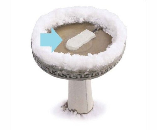 K&H Super Ice Eliminator Birdbath De-Icer maintaining open water in a snow-covered large birdbath.