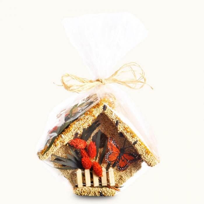 Mr. Bird All Season Wren Casita Birdhouse - Bird seed-covered wooden Wren house with butterflies and flowers, wrapped for gifting.