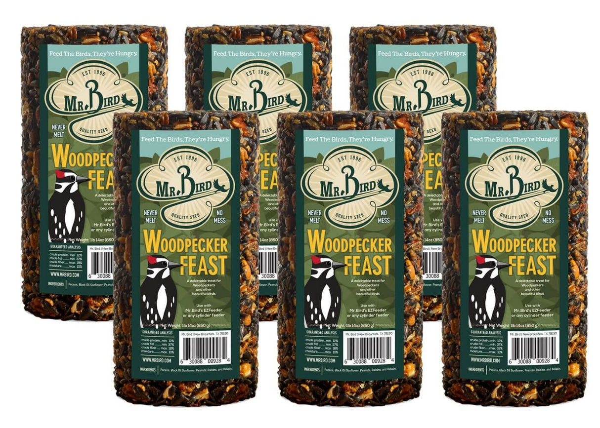 Mr. Bird Woodpecker Feast small bird seed cylinders in 1 lb. 14 oz. packs, perfect for attracting woodpeckers and backyard birds.
