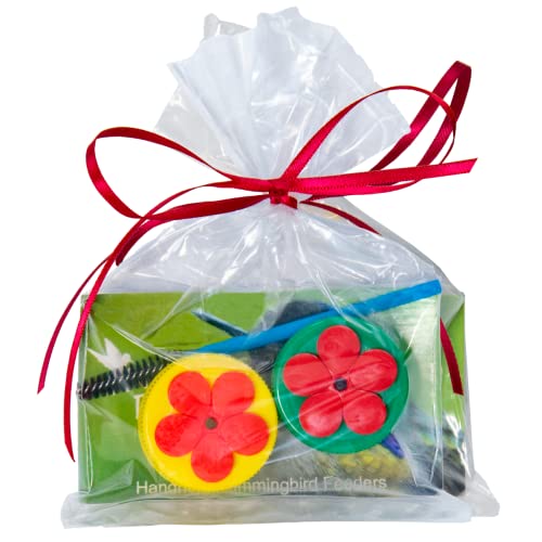 Nectar DOTs Hummingbird Feeder Kit in a gift bag with red ribbon, featuring yellow and red designs.