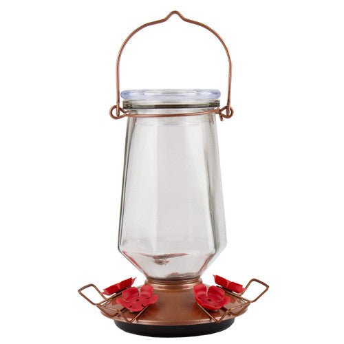 Perky-Pet 9109 Crystal Top-Fill Glass Hummingbird Feeder with copper base and red flower feeding ports