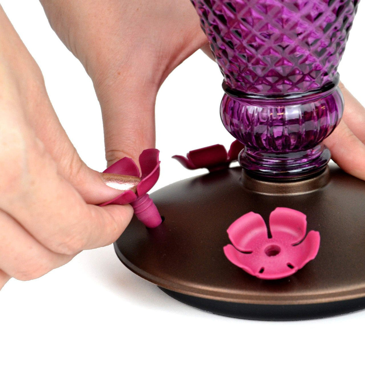 Assembling the Perky-Pet Diamond Wine Top-Fill Glass Hummingbird Feeder with removable flower ports