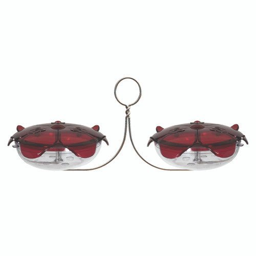 Ruby Sipper Duo Hanging Hummingbird Feeder with red covers, clear dishes, and stainless steel wire for easy hanging.