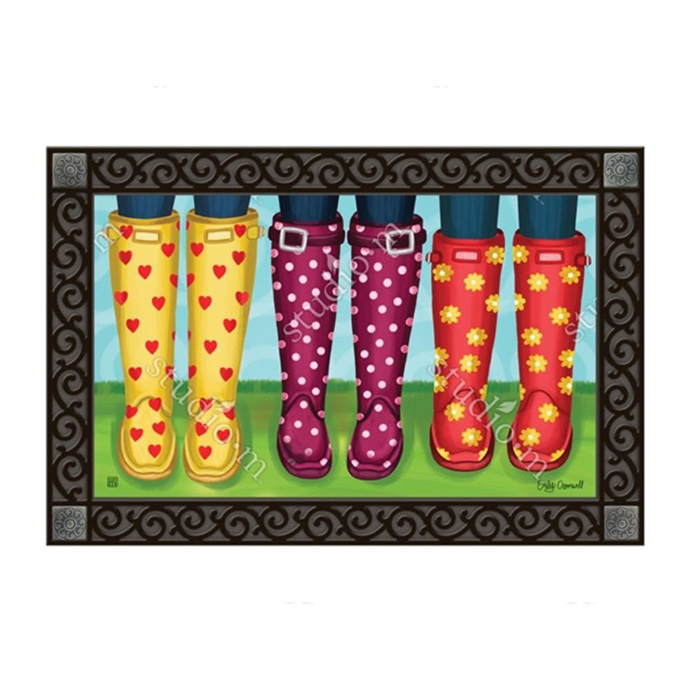 Studio M Happy Spring MatMate Doormat displaying colorful boots with heart, polka dot, and flower patterns, perfect for spring decor