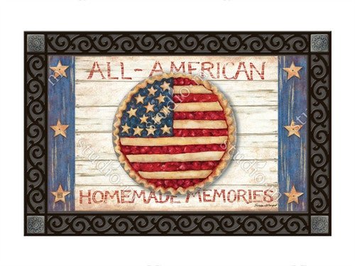 Studio M Homemade Memories MatMate Doormat with cherry pie American flag design and "All-American Homemade Memories" message on a wood table.