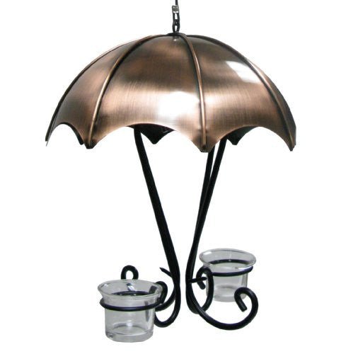 Metal hanging umbrella candle holder with two clear glass candle cups and ornate black metal accents featuring a copper-toned umbrella top and elegant swirls