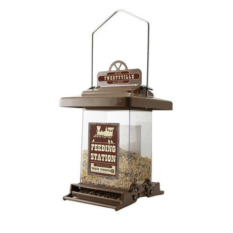 Woodlink Rustic Farmhouse Absolute® Small Train Feeding Station squirrel-resistant feeder with seeds.